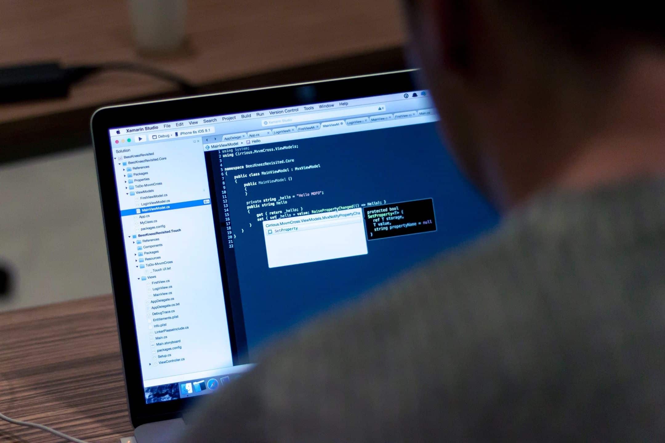 Man coding a web site design