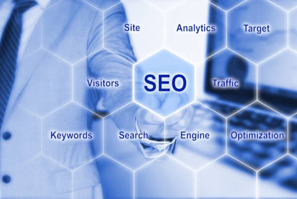 IT expert touching the word SEO on a hexagon grid with a business background and search engine optimization keywords 3D illustration